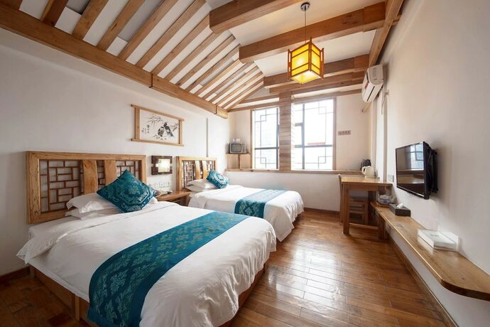 Imagen de la habitación del Hotel Minguo Life Zhangjiajie. Foto 35