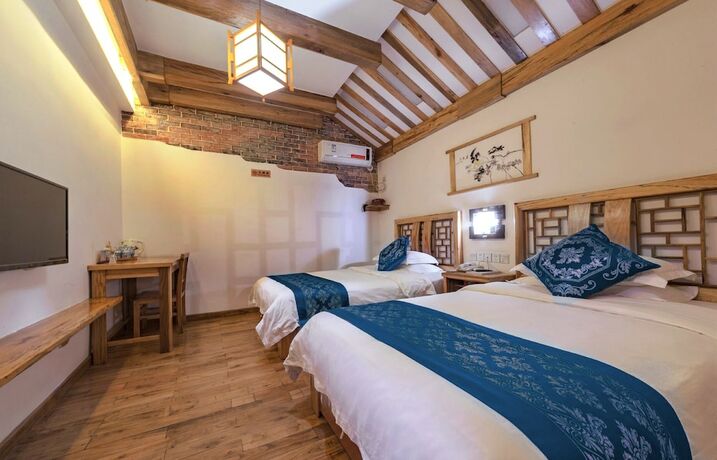 Imagen de la habitación del Hotel Minguo Life Zhangjiajie. Foto 37
