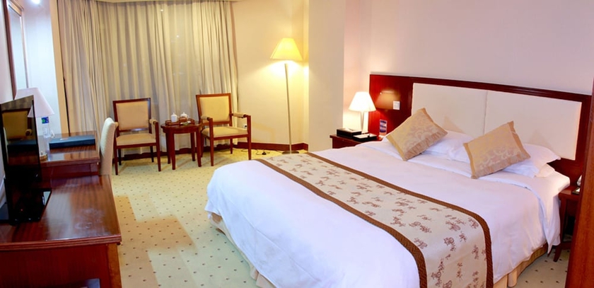 Imagen de la habitación del Hotel Mingyuan. Foto 7
