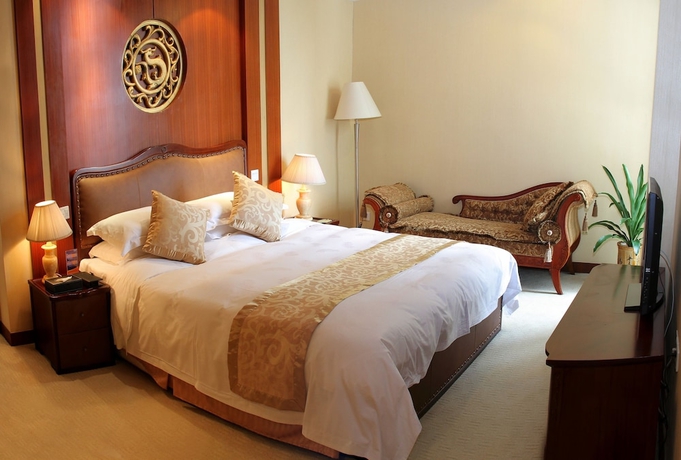Imagen de la habitación del Hotel Mingyuan. Foto 8