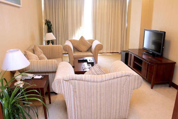 Imagen de la habitación del Hotel Mingyuan. Foto 9