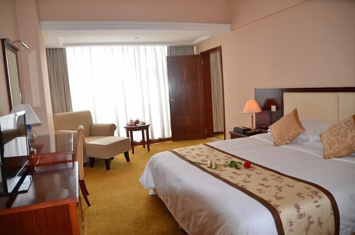 Imagen de la habitación del Hotel Mingyuan. Foto 10