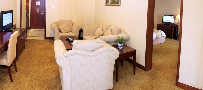 Imagen de la habitación del Hotel Mingyuan. Foto 11