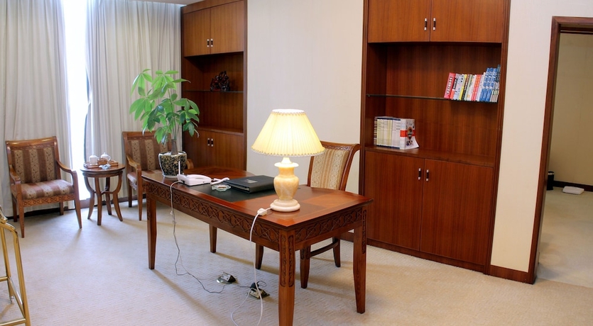 Imagen de la habitación del Hotel Mingyuan. Foto 12