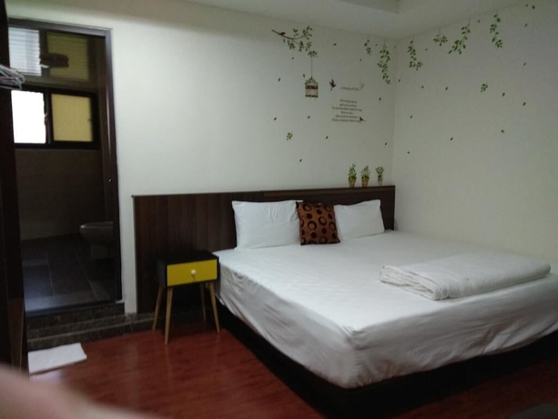 Imagen de la habitación del Hotel Mingyuan Homestay. Foto 2