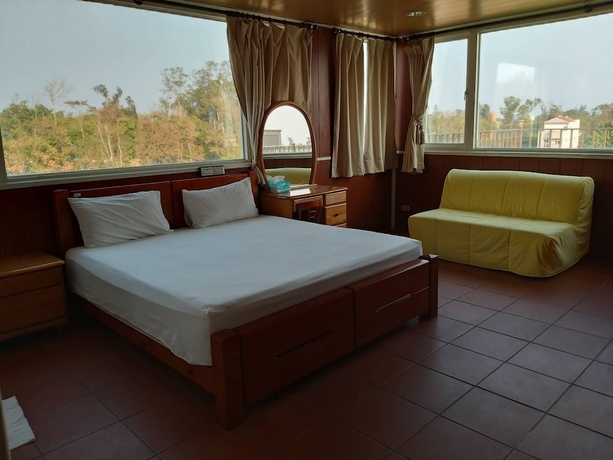 Imagen de la habitación del Hotel Mingyuan Homestay. Foto 4