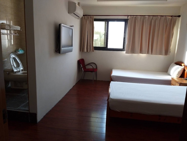 Imagen de la habitación del Hotel Mingyuan Homestay. Foto 6