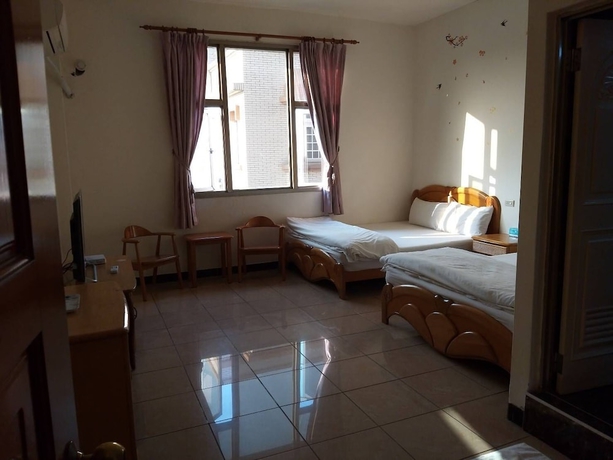 Imagen de la habitación del Hotel Mingyuan Homestay. Foto 7