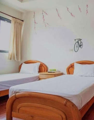 Imagen de la habitación del Hotel Mingyuan Homestay. Foto 13