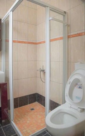 Imagen de la habitación del Hotel Mingyuan Homestay. Foto 17