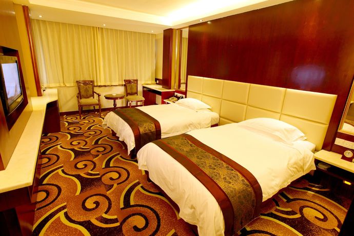 Imagen de la habitación del Hotel Mingyuan Hotel. Foto 6