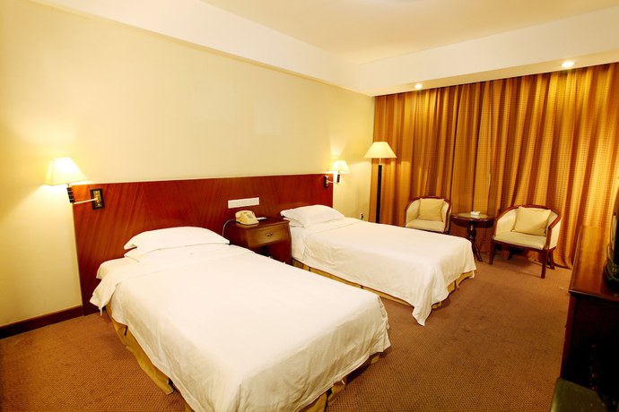 Imagen de la habitación del Hotel Mingyuan Hotel. Foto 9