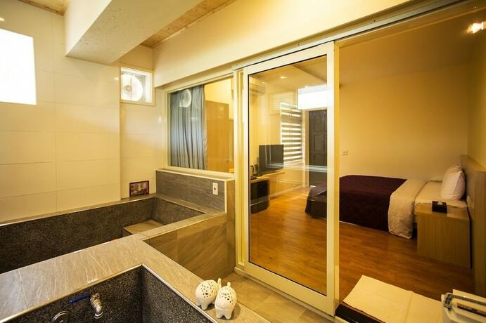 Imagen de la habitación del Hotel Mingyuan Hotspring. Foto 16