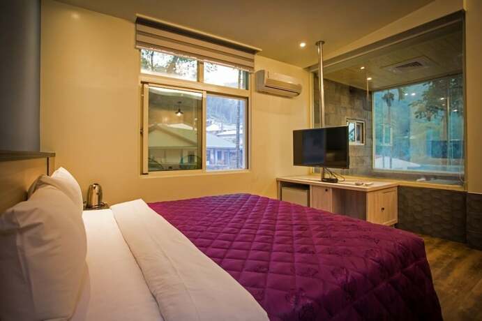 Imagen de la habitación del Hotel Mingyuan Hotspring. Foto 17