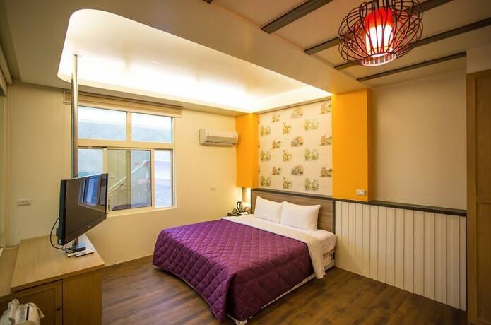 Imagen de la habitación del Hotel Mingyuan Hotspring. Foto 18