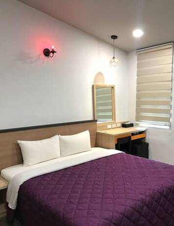 Imagen de la habitación del Hotel Mingyuan Hotspring. Foto 19