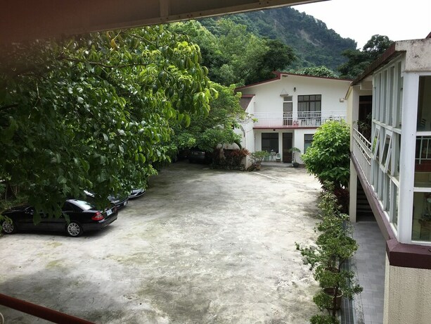 Imagen de los exteriores del Hotel Mingyuan Hotspring. Foto 25