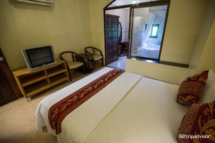 Imagen de la habitación del Hotel Minh Chau. Foto 9