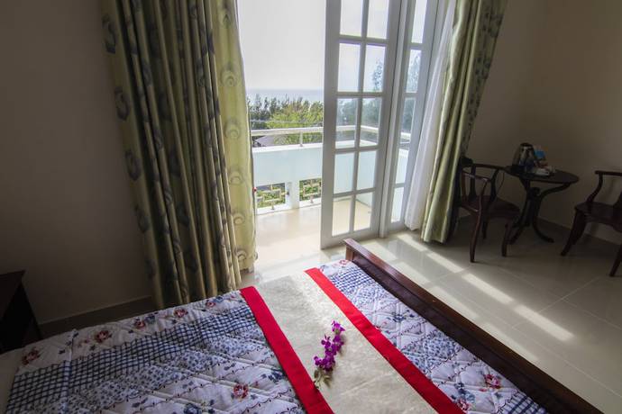 Imagen de la habitación del Hotel Minh Dam Hotel and Restaurant. Foto 10