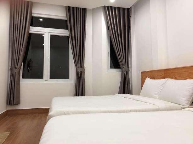 Imagen de la habitación del Hotel Minh Huy. Foto 12