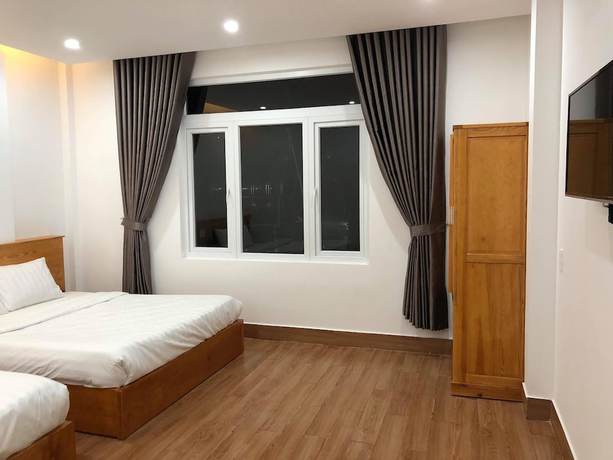Imagen de la habitación del Hotel Minh Huy. Foto 14