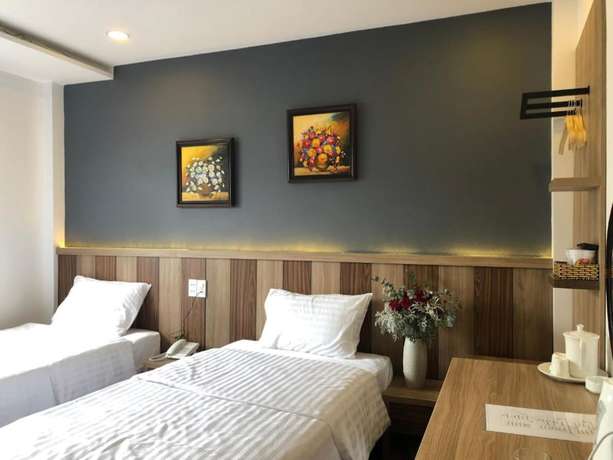Imagen de la habitación del Hotel Minh Nguyen. Foto 9