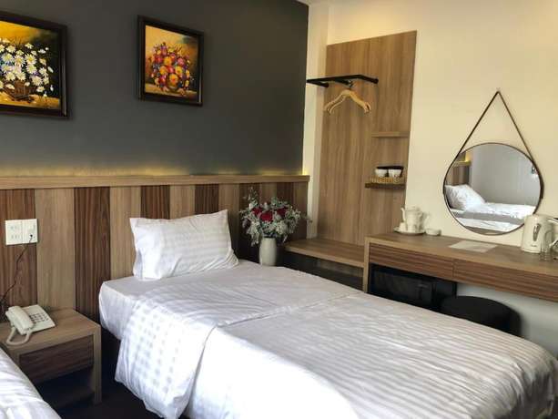 Imagen de la habitación del Hotel Minh Nguyen. Foto 13