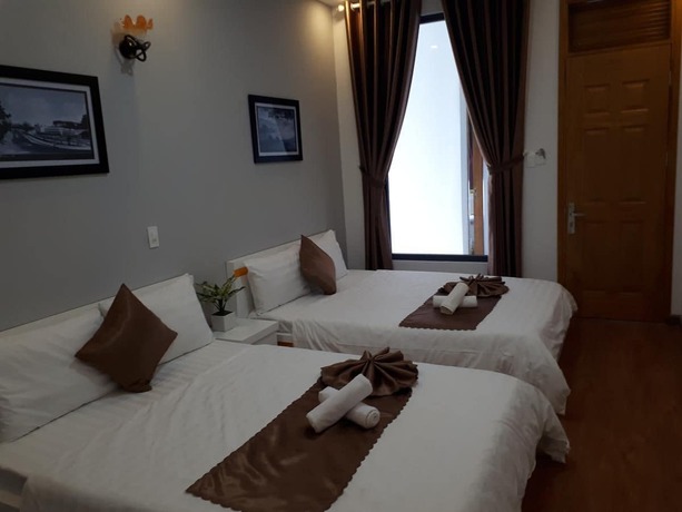 Imagen de la habitación del Hotel Minh Quan. Foto 9