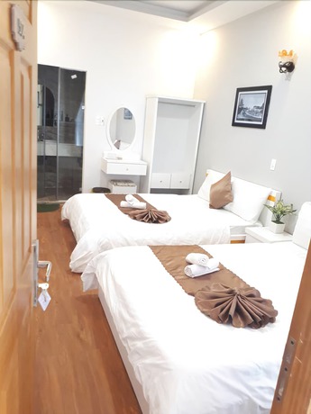Imagen de la habitación del Hotel Minh Quan. Foto 12
