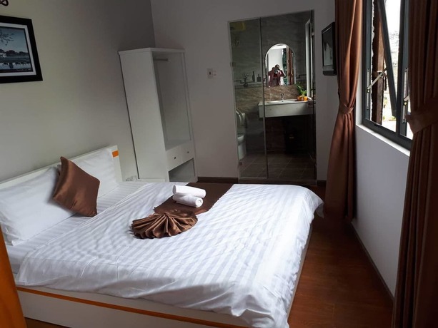 Imagen de la habitación del Hotel Minh Quan. Foto 13