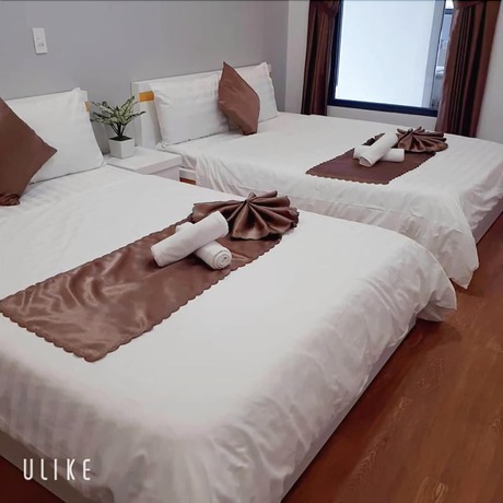 Imagen de la habitación del Hotel Minh Quan. Foto 14