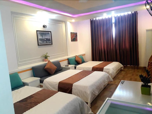 Imagen de la habitación del Hotel Minh Quan. Foto 17