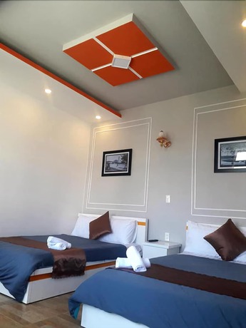 Imagen de la habitación del Hotel Minh Quan. Foto 19