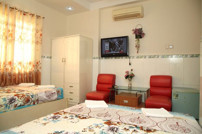 Imagen de la habitación del Hotel Minh Quang, Ho Chi Minh. Foto 6