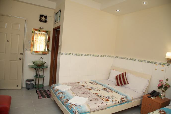 Imagen de la habitación del Hotel Minh Quang, Ho Chi Minh. Foto 7