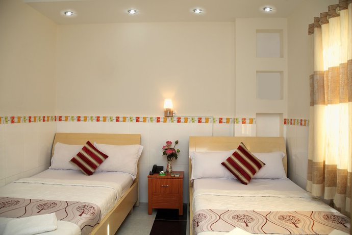 Imagen de la habitación del Hotel Minh Quang, Ho Chi Minh. Foto 9