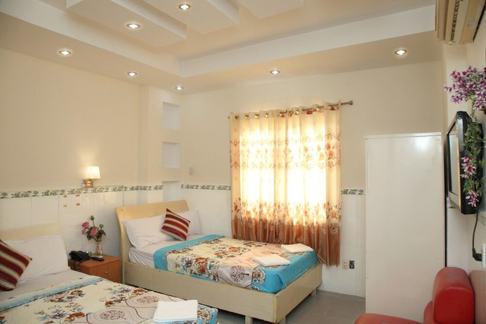 Imagen de la habitación del Hotel Minh Quang, Ho Chi Minh. Foto 14
