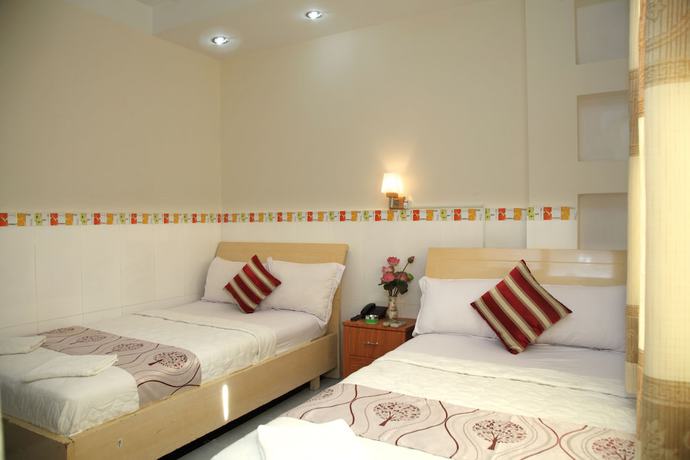 Imagen de la habitación del Hotel Minh Quang, Ho Chi Minh. Foto 15