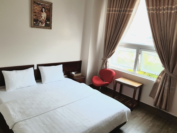 Imagen de la habitación del Hotel Minh Trang Motel. Foto 10