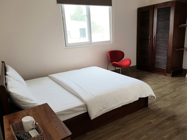 Imagen de la habitación del Hotel Minh Trang Motel. Foto 11