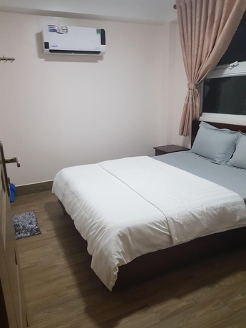 Imagen de la habitación del Hotel Minh Trang Motel. Foto 17