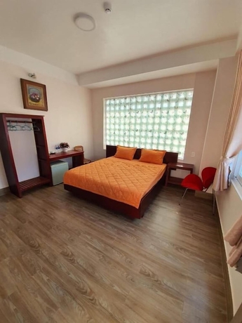 Imagen de la habitación del Hotel Minh Trang Motel. Foto 18