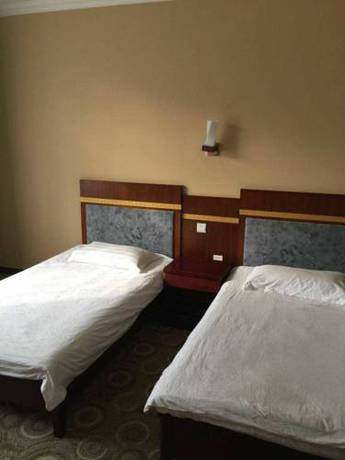 Imagen de la habitación del Hotel Minhang. Foto 4