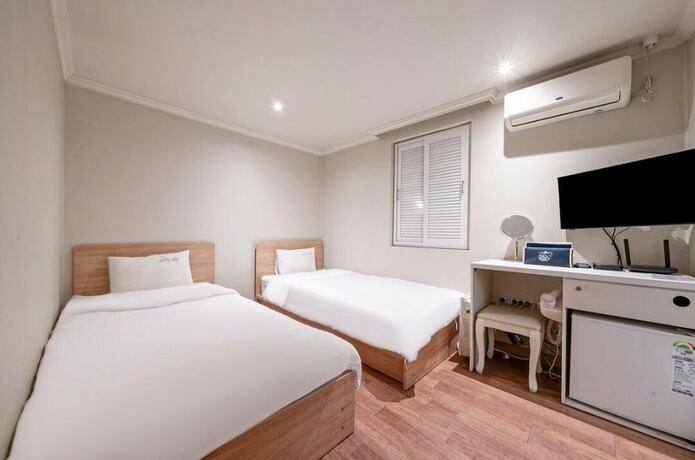 Imagen de la habitación del Hotel Mini, Busan. Foto 17