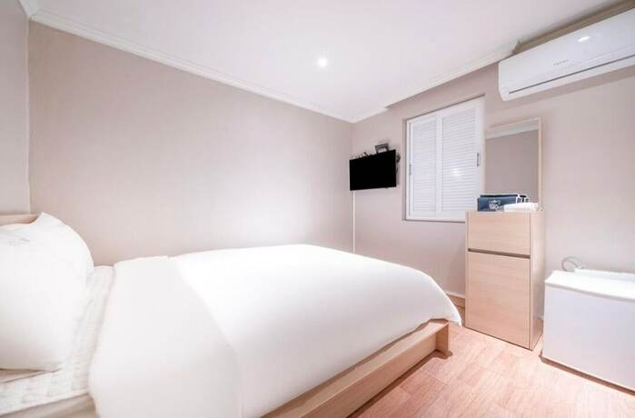 Imagen de la habitación del Hotel Mini, Busan. Foto 24