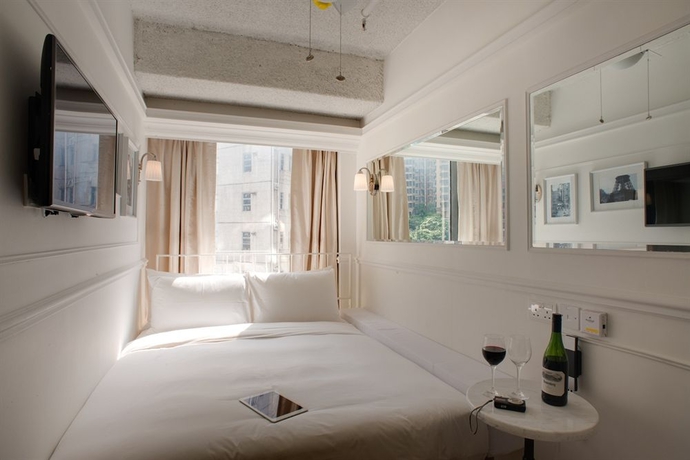 Imagen de la habitación del Hotel Mini Causeway Bay Hong Kong. Foto 5