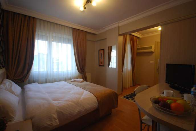 Imagen de la habitación del Hotel Mini Fuar. Foto 4