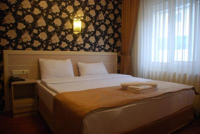 Imagen de la habitación del Hotel Mini Fuar. Foto 5