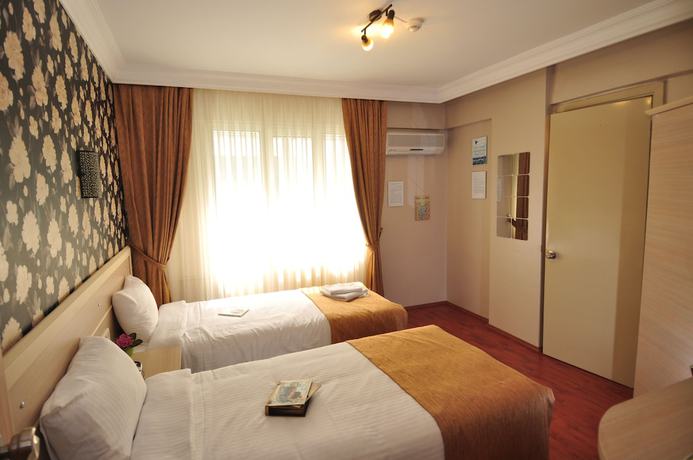 Imagen de la habitación del Hotel Mini Fuar. Foto 8