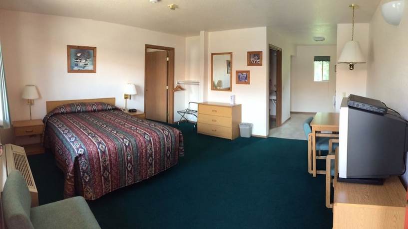 Imagen de la habitación del Hotel Mini Golden Inns Motel. Foto 7